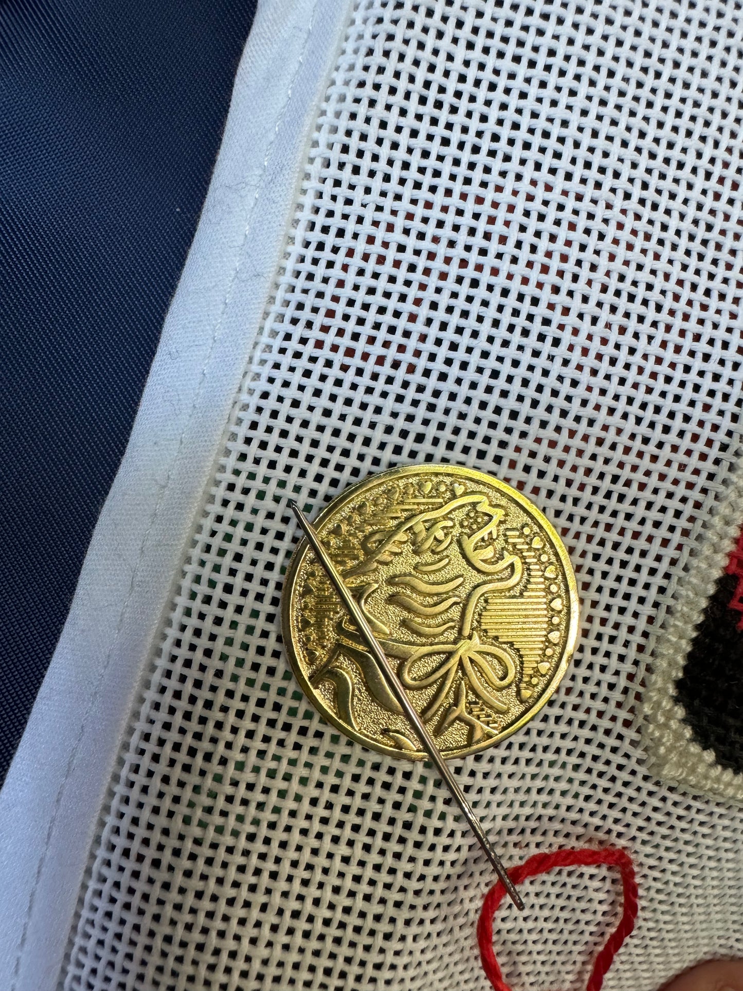 Needle Minder, TIGER COIN