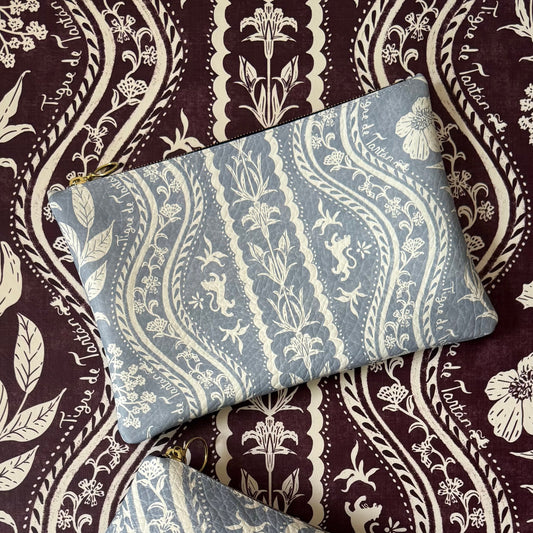 Medium leather pouch in the Domino Faded Carolina print by Tigre de Tartán