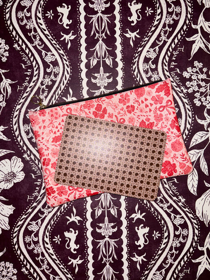 Ditsy Christmas MARASCHINO medium leather pouch with a mahjong card on a dark floral background