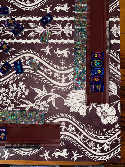 Mahj Pit Confetti mahjong tiles, large size, arranged on a mahjong rack