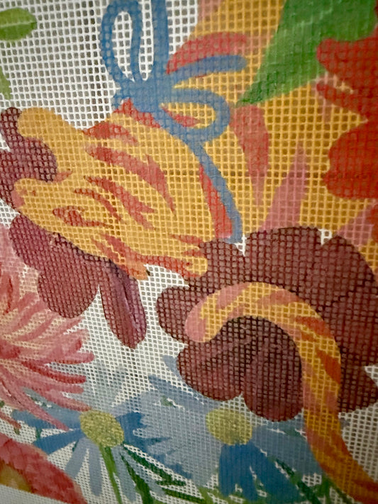 Close-up of the 20-inch Jardín de Los Jefes printed canvas showing a tiger, blue bow and dahlia on 14 mesh